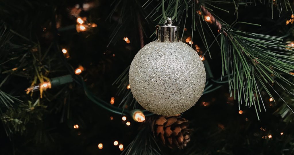 Christmas tree lights and silver ball ornament