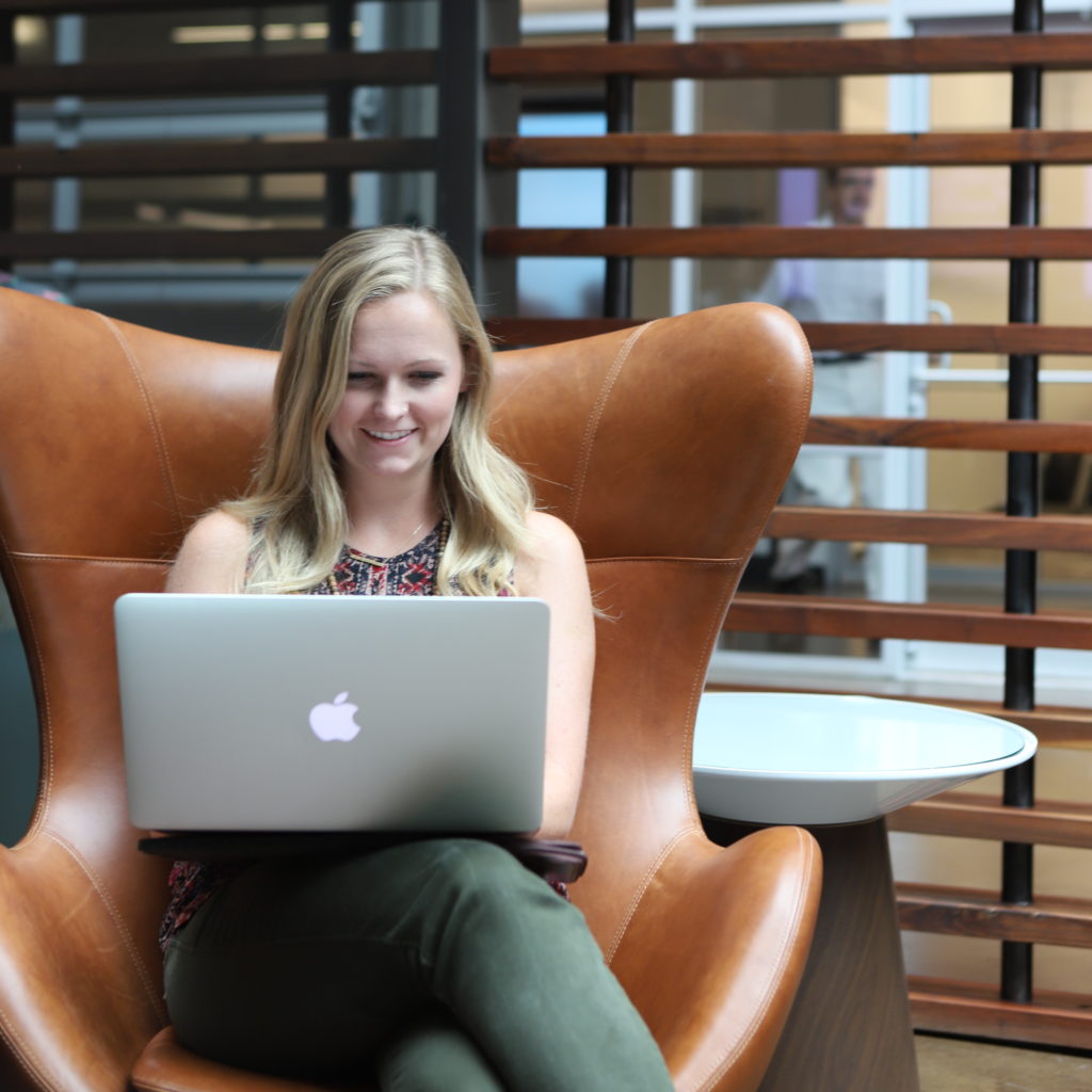 Lady on laptop in coworking space