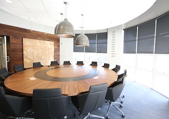 Round table boardroom with windows in Buckhead