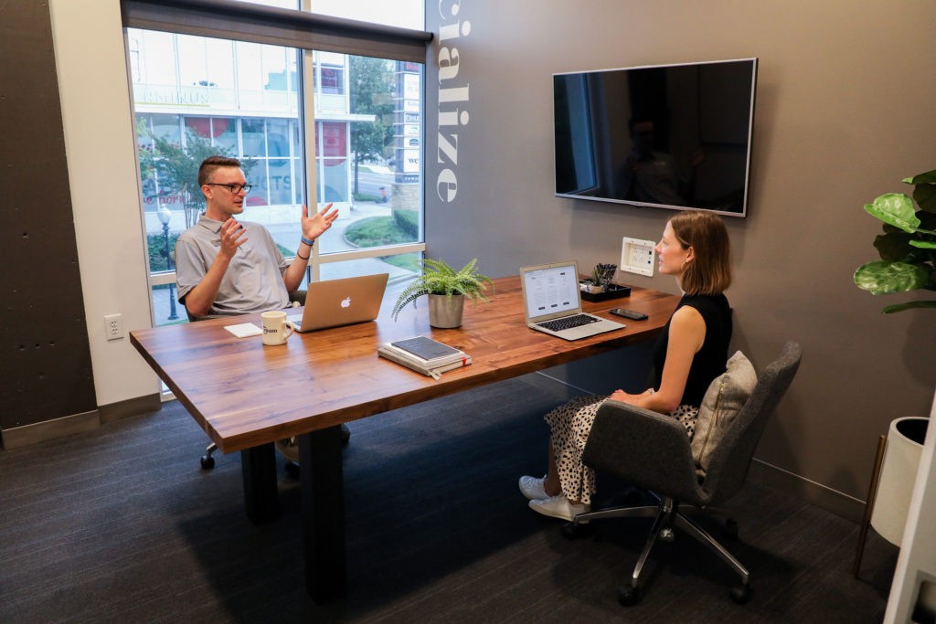 Team meeting in Buckhead office with windows