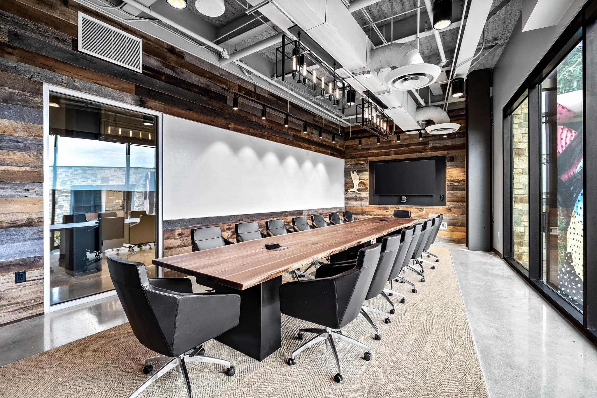 Retreat-inspired boardroom with complimentary A/V at Roam Grandscape