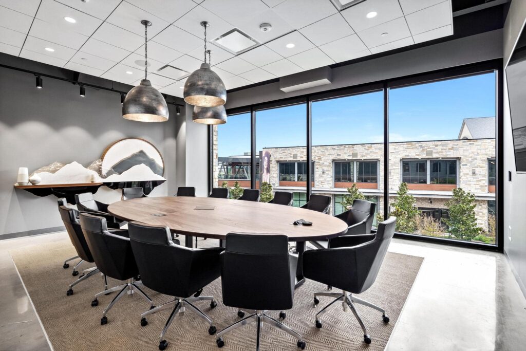 Natural light in Summit boardroom seating 14 people at Roam Grandscape