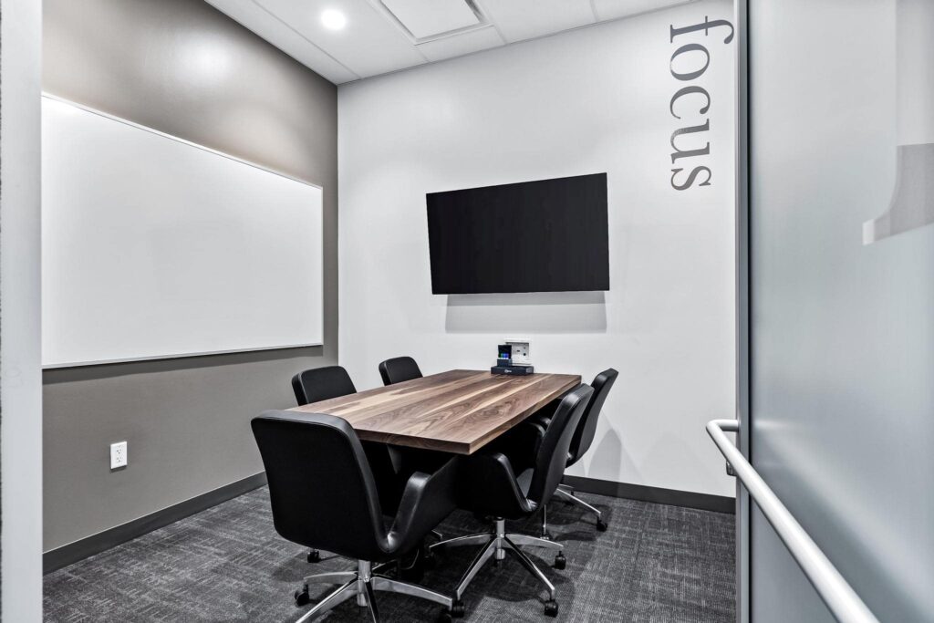 Small meeting room seating up to 5 people with all A/V included at Roam Grandscape in North Dallas, Texas