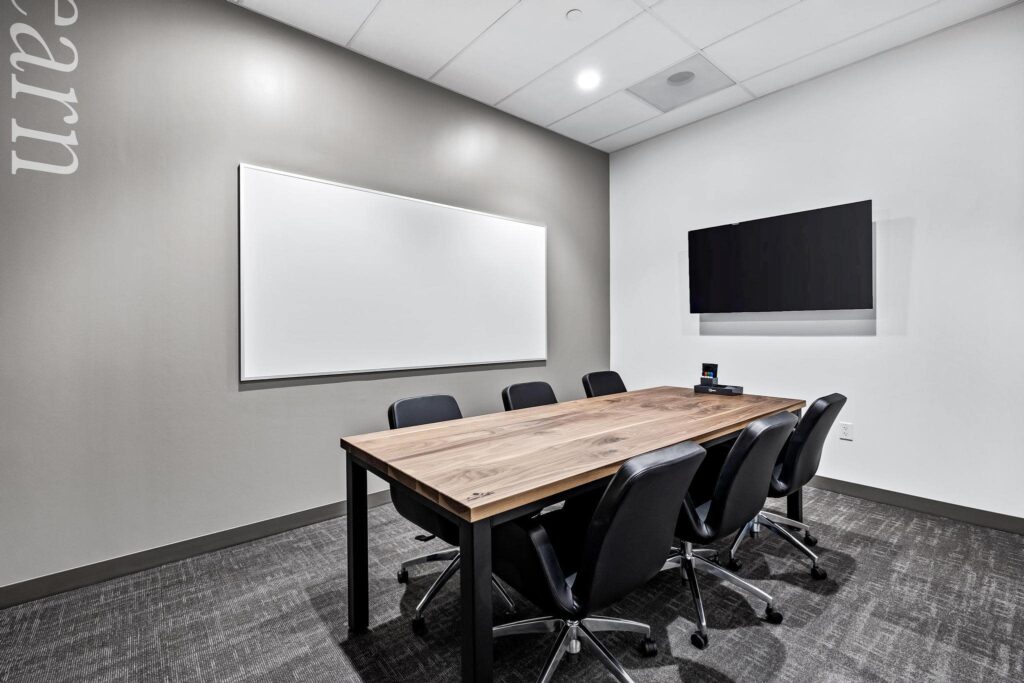 6-person meeting room available for rent at Roam Grandscape in North Dallas, Texas