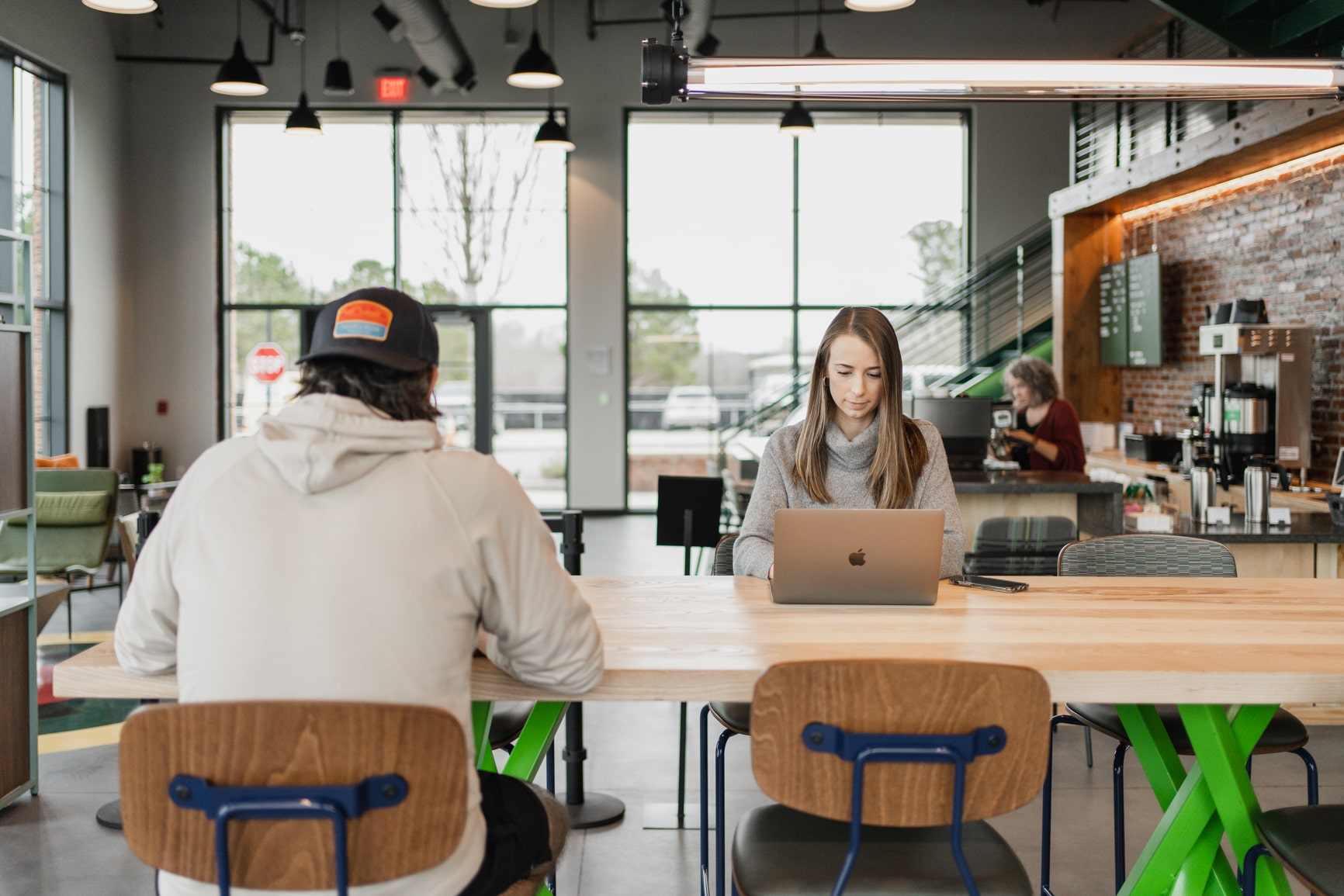 people sitting at a coffee bar