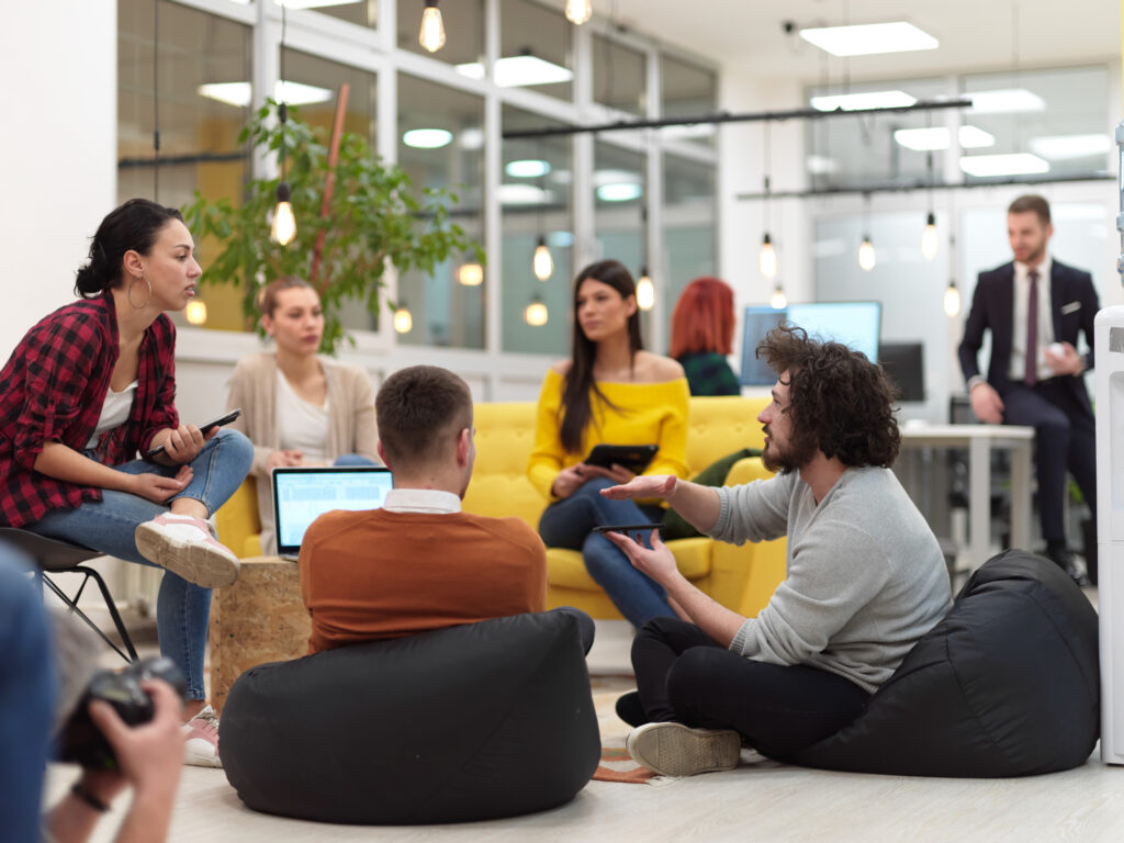 creatives meeting and brainstorming in coworking space