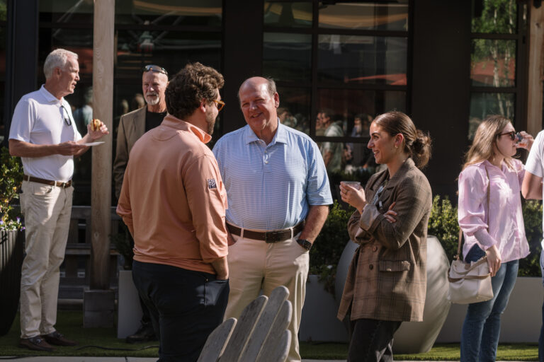 Coworking and networking with coworkers at Roam's event spaces.